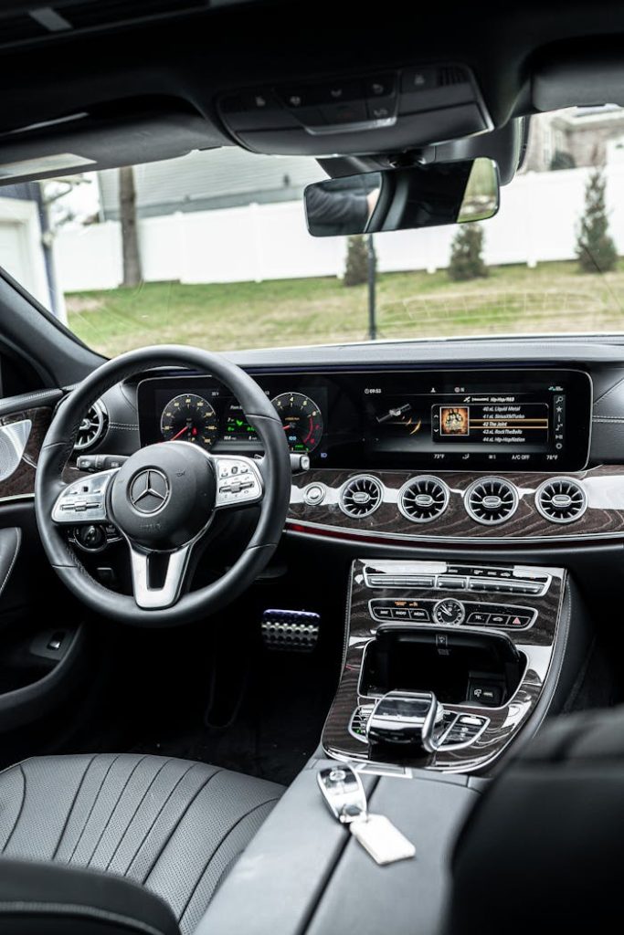 Explore the sophisticated interior of a Mercedes Benz with modern technology and luxury finishes.